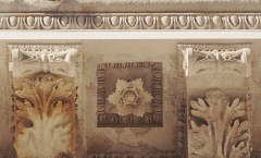 Modillions installed on architectural stone cornice