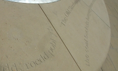 English and Welsh letters carved on the 6 metre stone base 