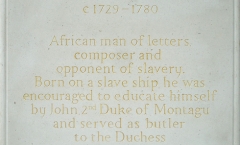 Carved and gilded stone plaque