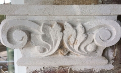 Sand and lime added onto weathered stone capital 