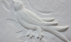 Martlet relief carving
