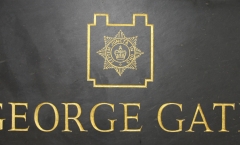 Gilded name and shield Gilded name and shield